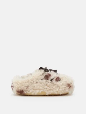 Evx Mules met krullend koeienprint
