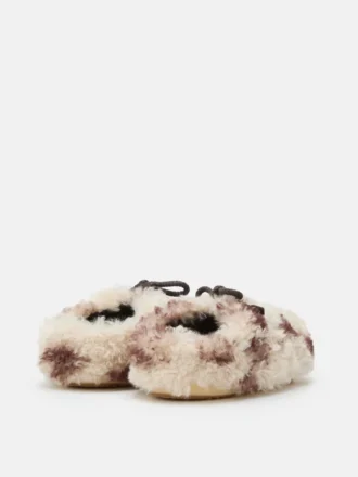 Evx Mules met krullend koeienprint