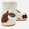 Icon Low laarsjes zonder veters met koeienprint