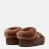 Moon Boot X Guest in Residence Evx Chalet Cocoa Mules van imitatiebont Moon Boot X Guest in Residence Evx Chalet Cocoa Mules van imitatiebont